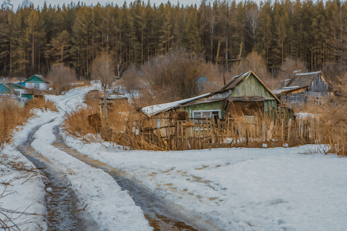 На самом деле это конечно же "Уральская весна в деревне", сразу видно.