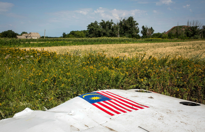 ������� ������� ����� MH17 ������������ Malaysia Airlines, ���� 2014 ����. ��������: Rob Stothard / Getty Images.